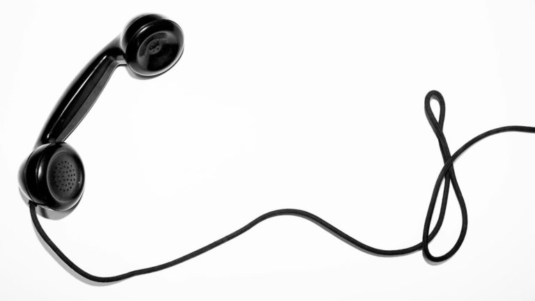 black corded telephone